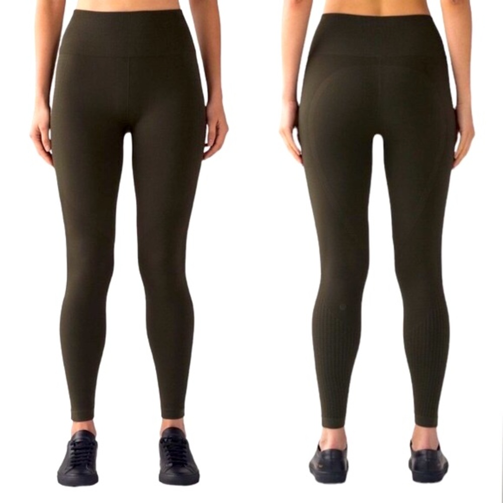 Lululemon Flow & Go Tight
in Dark Olive. 
Size 4. 
Pristine Condition.